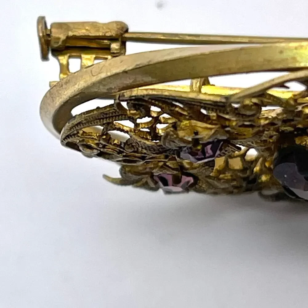 Antique Brass Filigree Brooch with Amethyst-Colored Stones | Trombone Clasp Pin